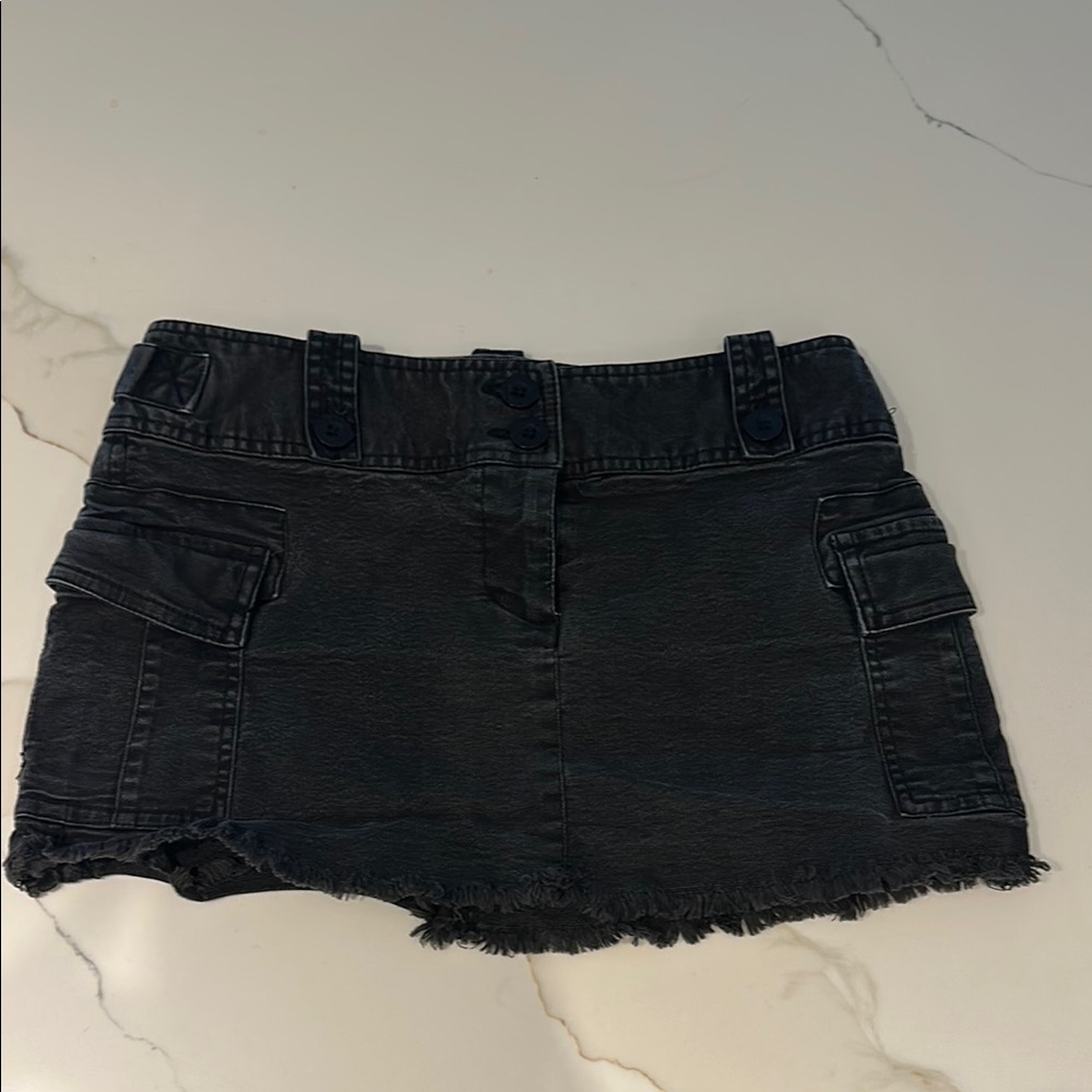 Black Cargo mini skirt with Distressed Hem and Belt Loops fits like size 26/27